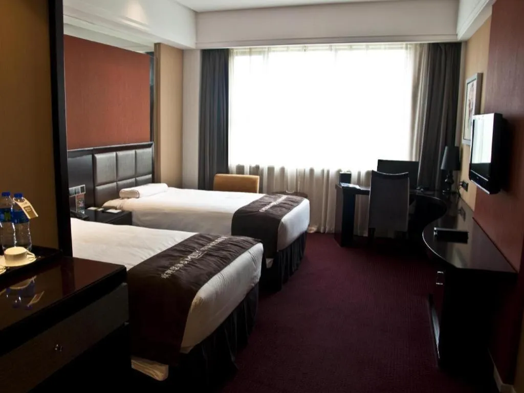 Bed in New Century Manju Hotel Shanghai New International Expo Center