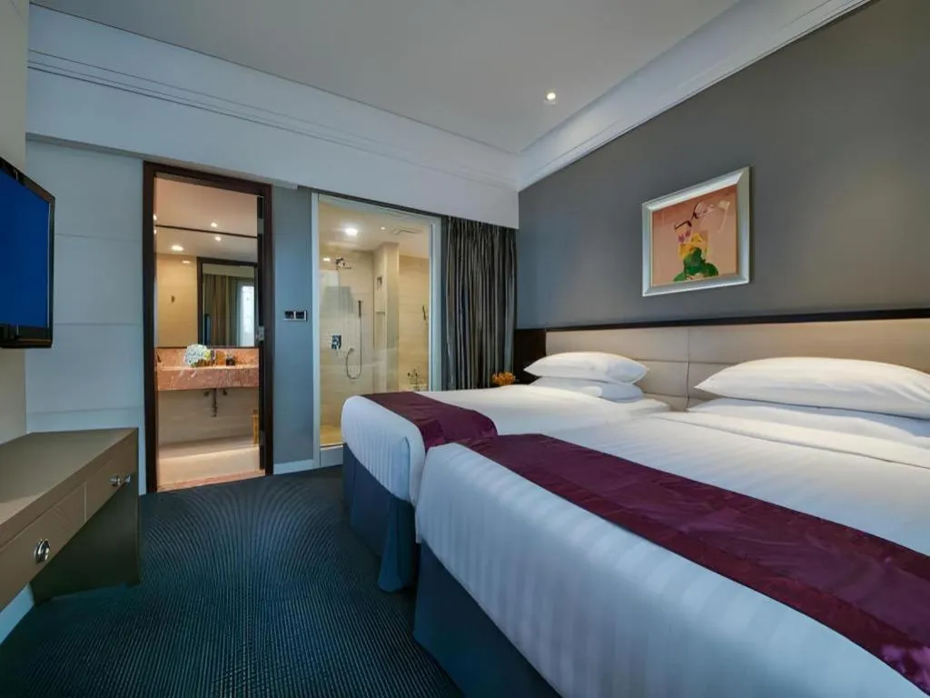 Bed in New Century Manju Hotel Shanghai New International Expo Center