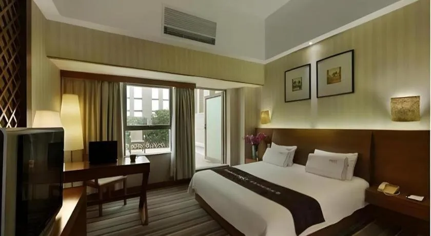 Bed in South China Laguna Hotel