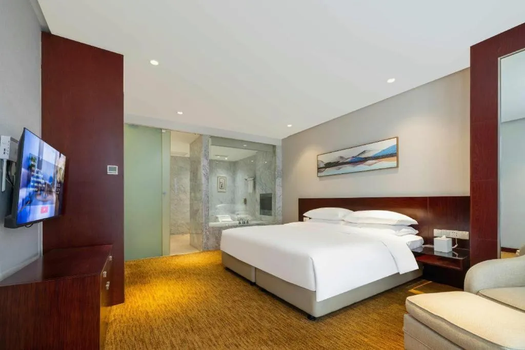 Bed in New Century Hotel Nanjing