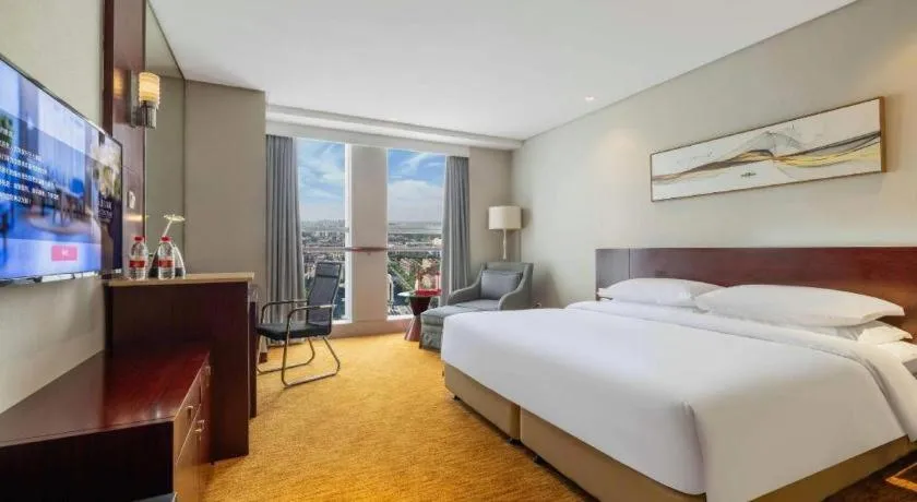 Bed in New Century Hotel Nanjing