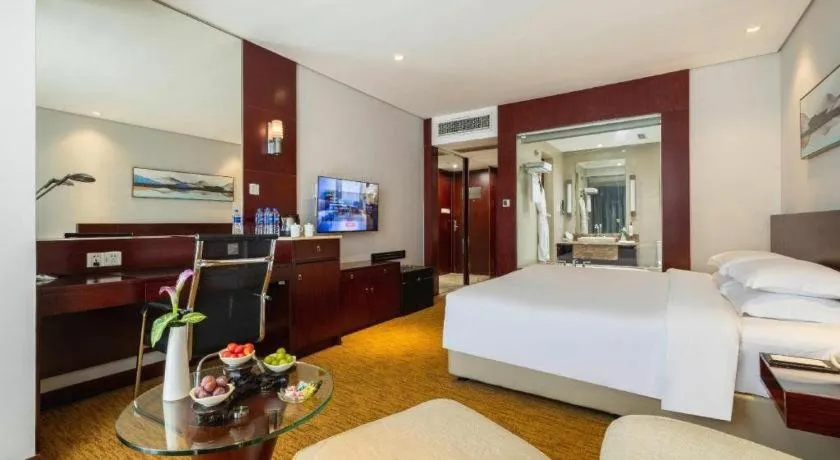 Bed in New Century Hotel Nanjing