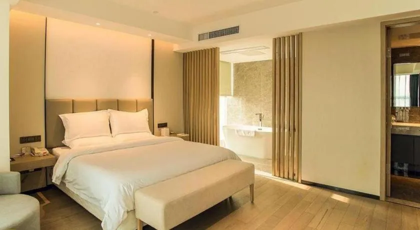 Bed in New Century Hotel Nanjing