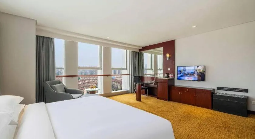 Bed in New Century Hotel Nanjing