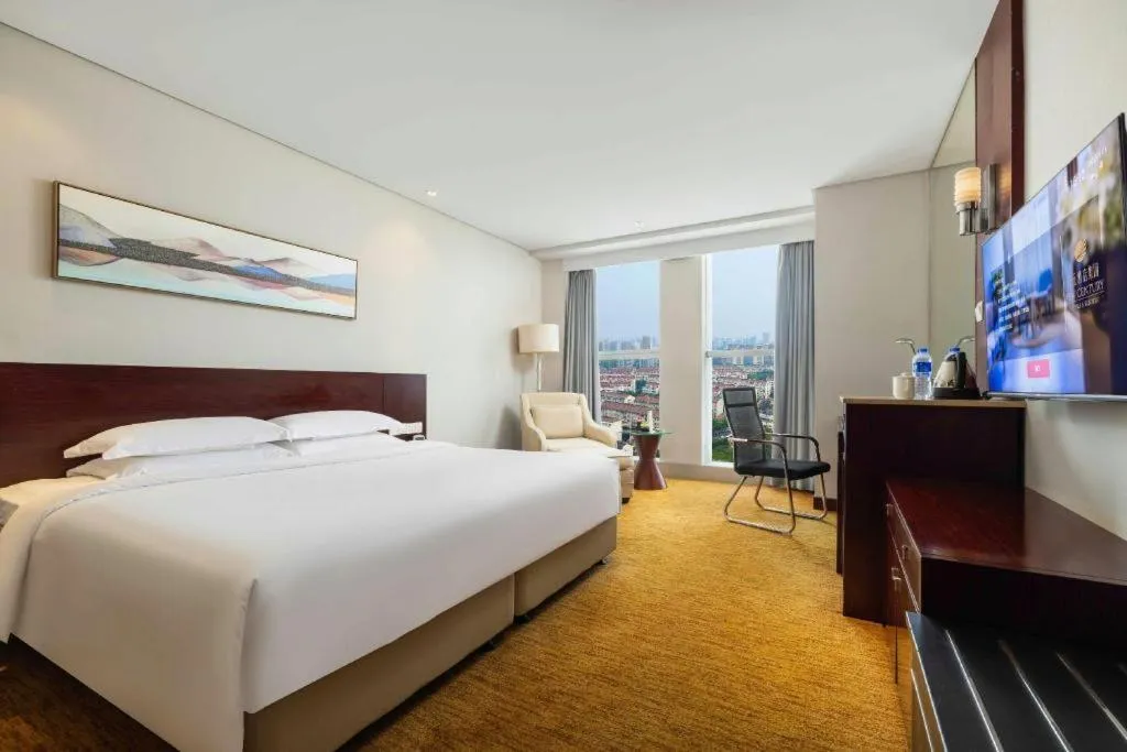 Bed in New Century Hotel Nanjing