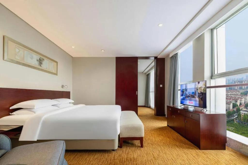 Bed in New Century Hotel Nanjing