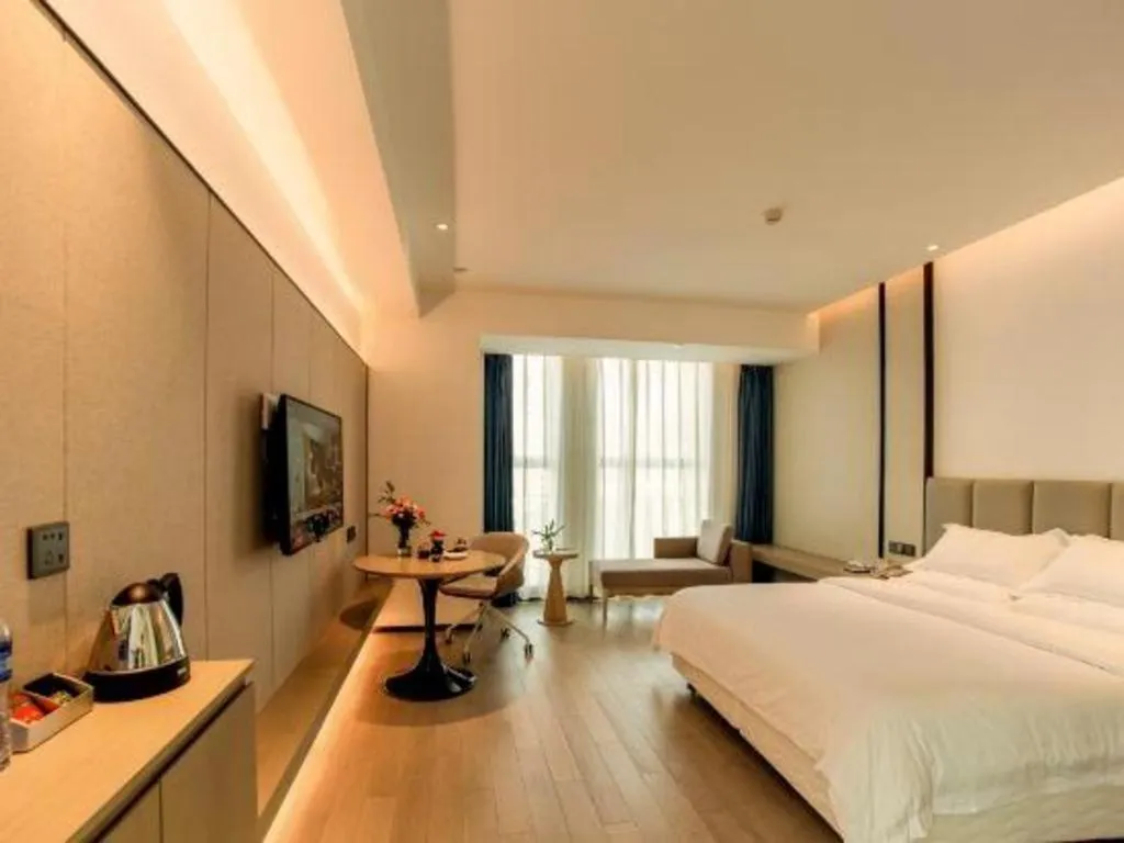 Bed in New Century Hotel Nanjing