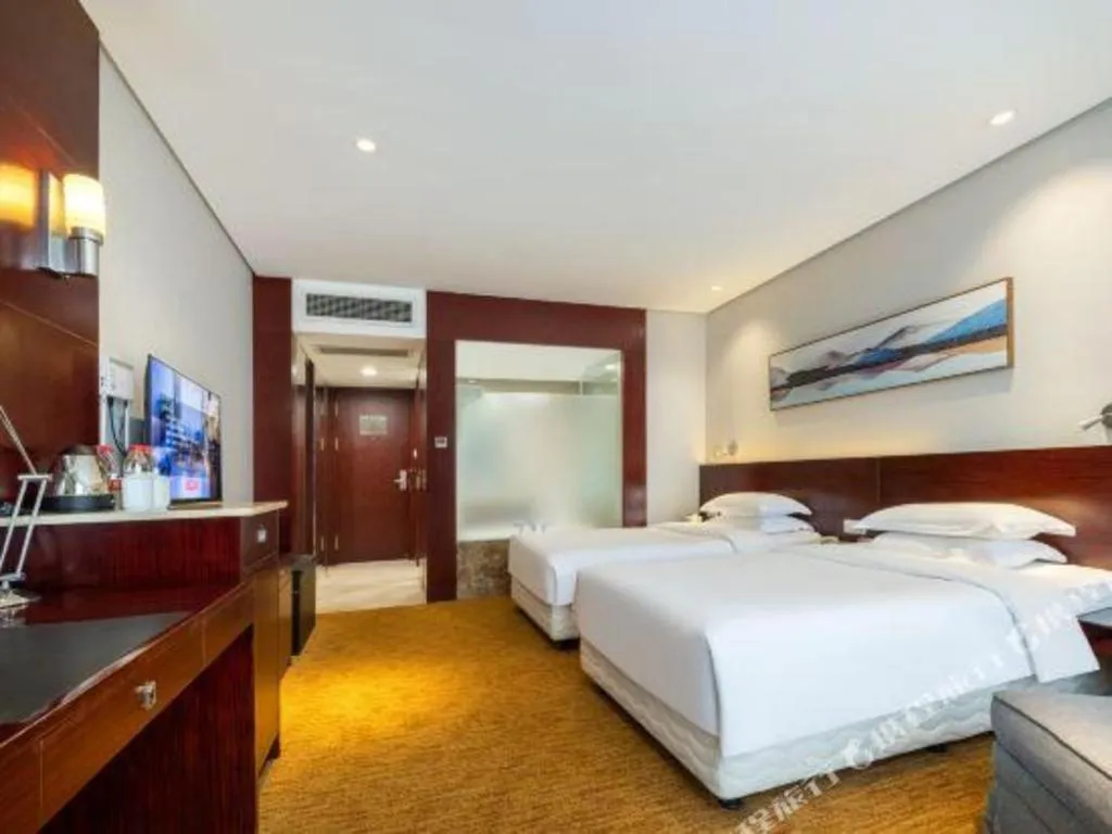 Bed in New Century Hotel Nanjing