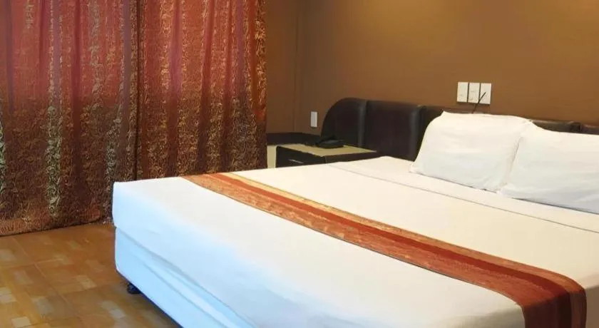 Bed in Holiday Spa Hotel