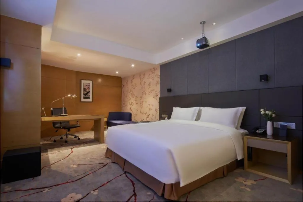 Bed in Yueyang Grand Skylight Hotel