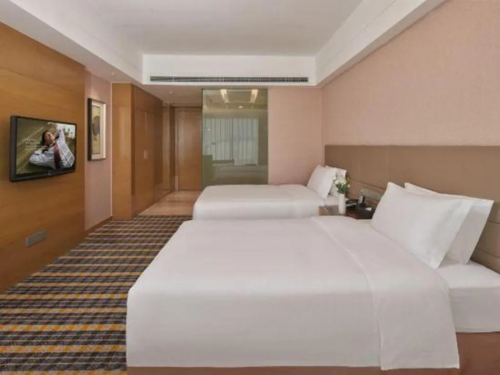 Bed in Yueyang Grand Skylight Hotel