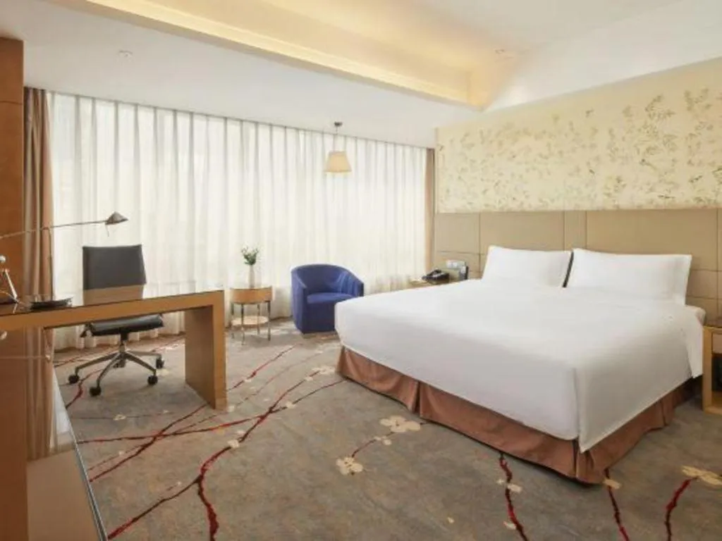 Bed in Yueyang Grand Skylight Hotel