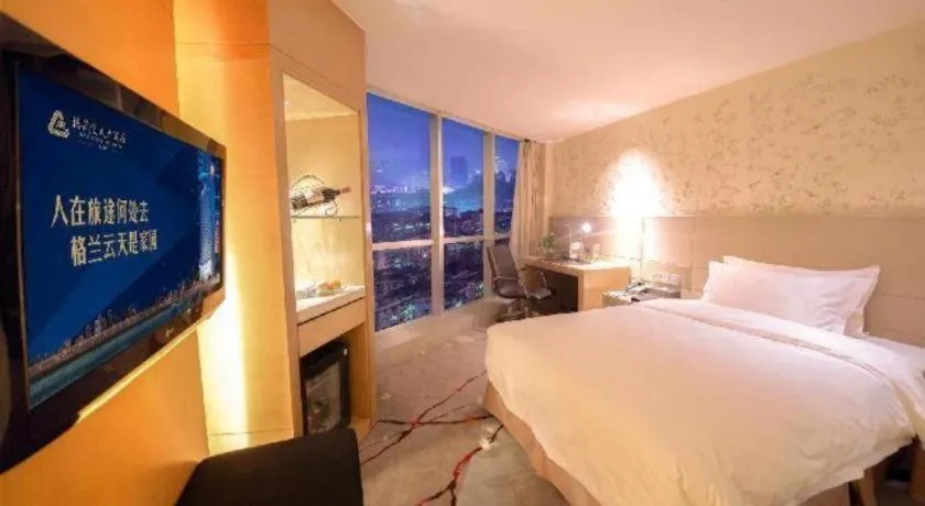 Bed in Yueyang Grand Skylight Hotel