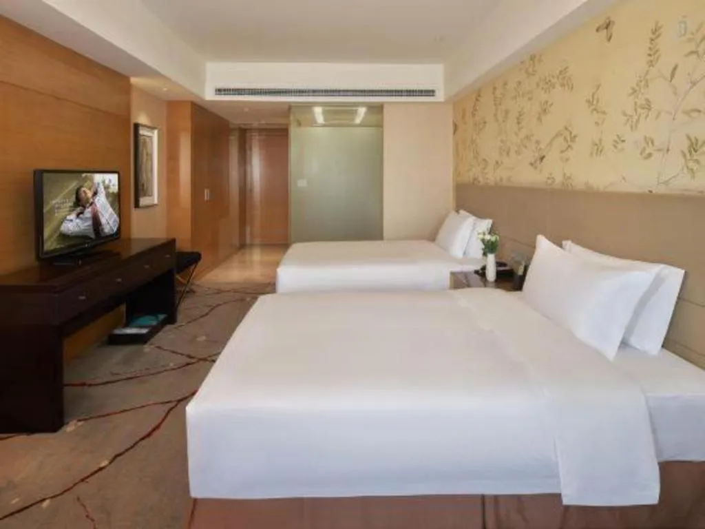 Bed in Yueyang Grand Skylight Hotel