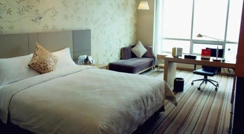 Bed in Yueyang Grand Skylight Hotel