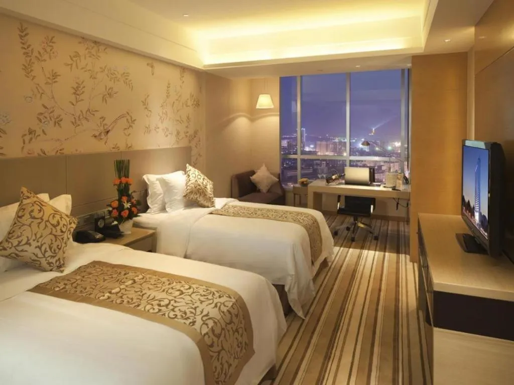 Bed in Yueyang Grand Skylight Hotel
