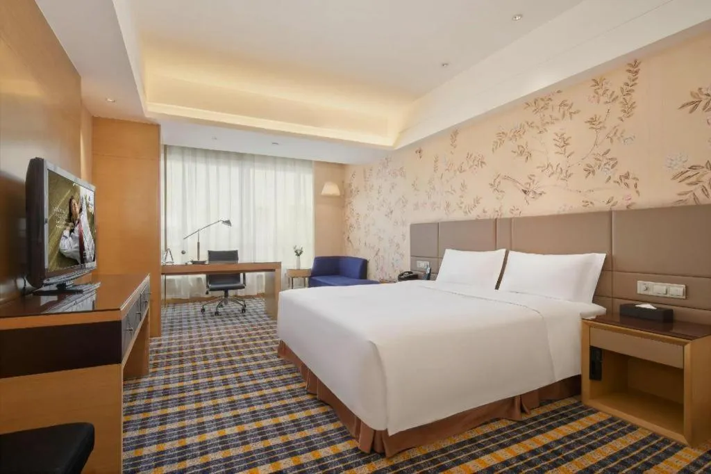 Bed in Yueyang Grand Skylight Hotel