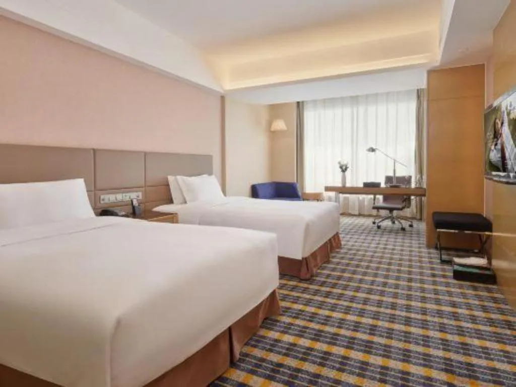 Bed in Yueyang Grand Skylight Hotel