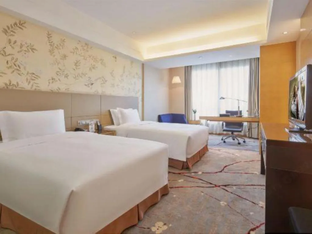 Bed in Yueyang Grand Skylight Hotel