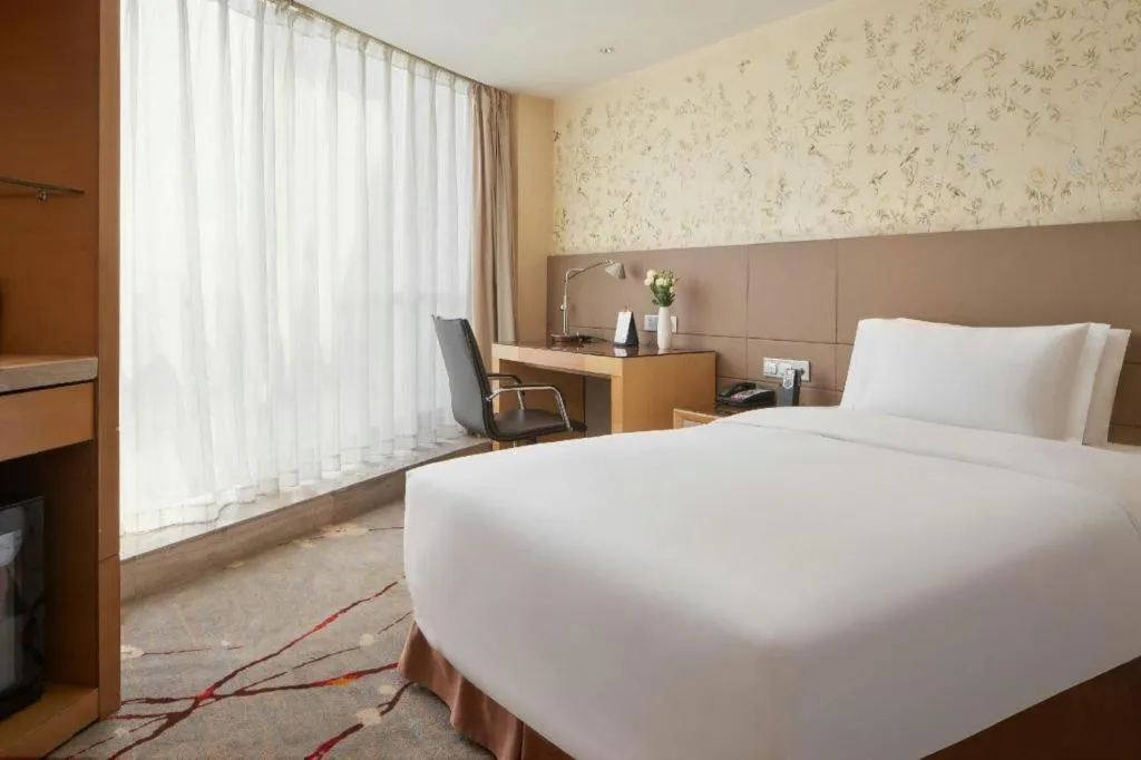 Bed in Yueyang Grand Skylight Hotel