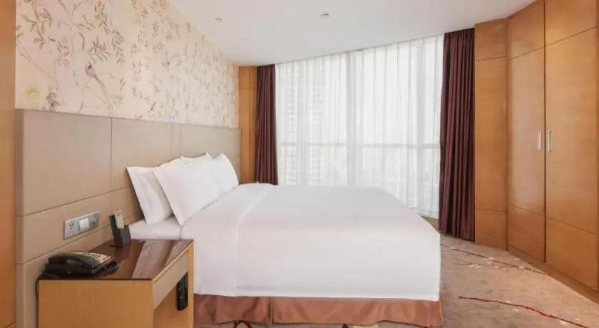 Bed in Yueyang Grand Skylight Hotel