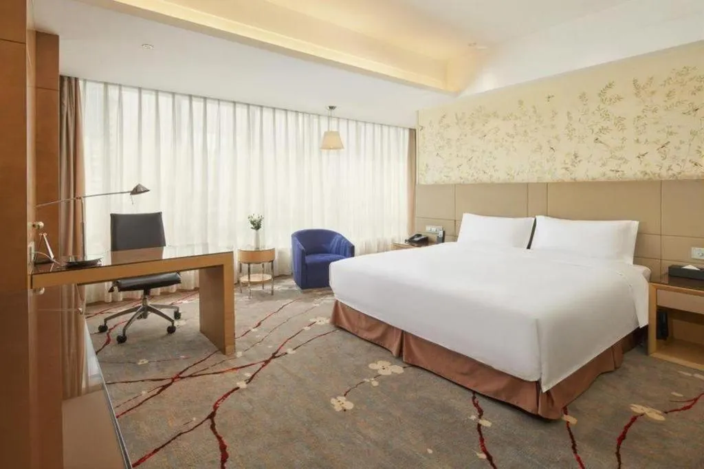 Bed in Yueyang Grand Skylight Hotel