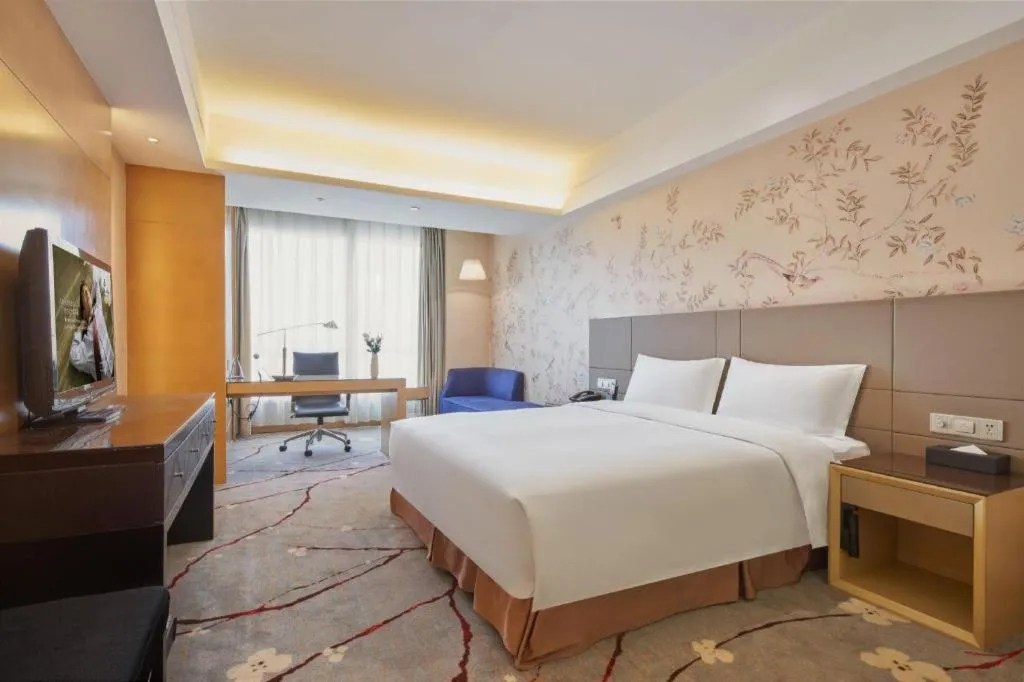 Bed in Yueyang Grand Skylight Hotel