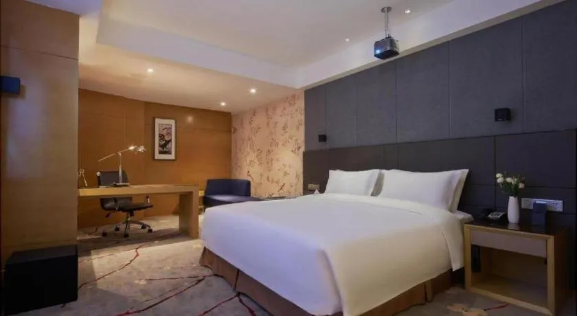 Bed in Yueyang Grand Skylight Hotel