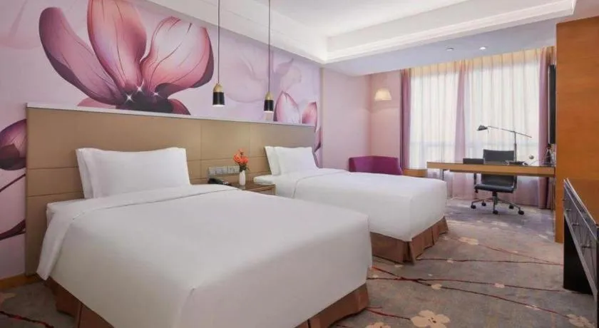 Bed in Yueyang Grand Skylight Hotel