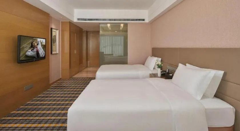 Bed in Yueyang Grand Skylight Hotel