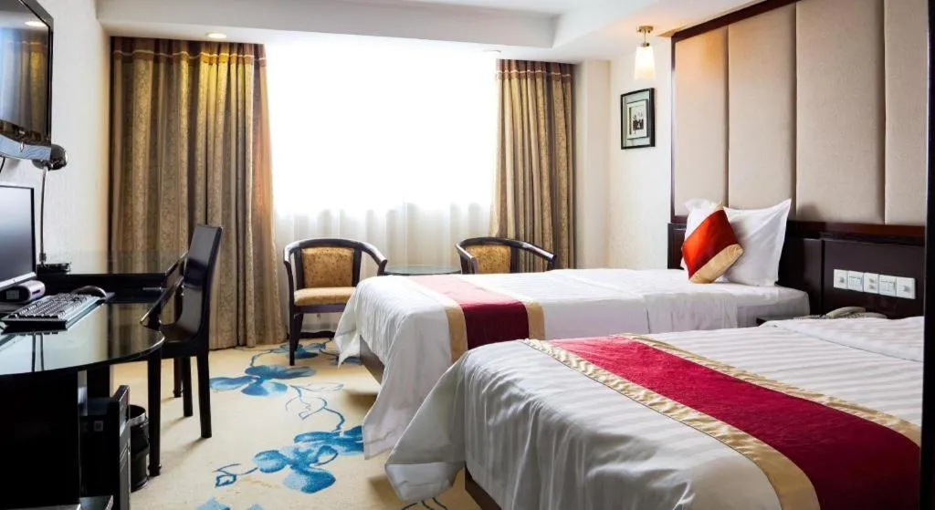 Bed in New World Hotel