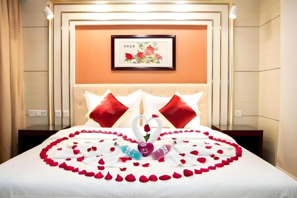 Bed in New World Hotel