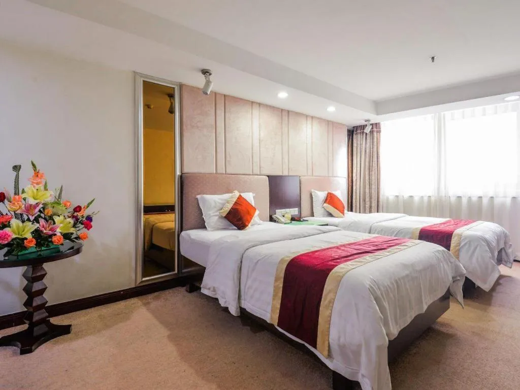 Bed in New World Hotel