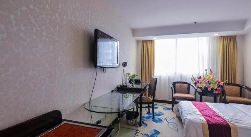 Bed in New World Hotel