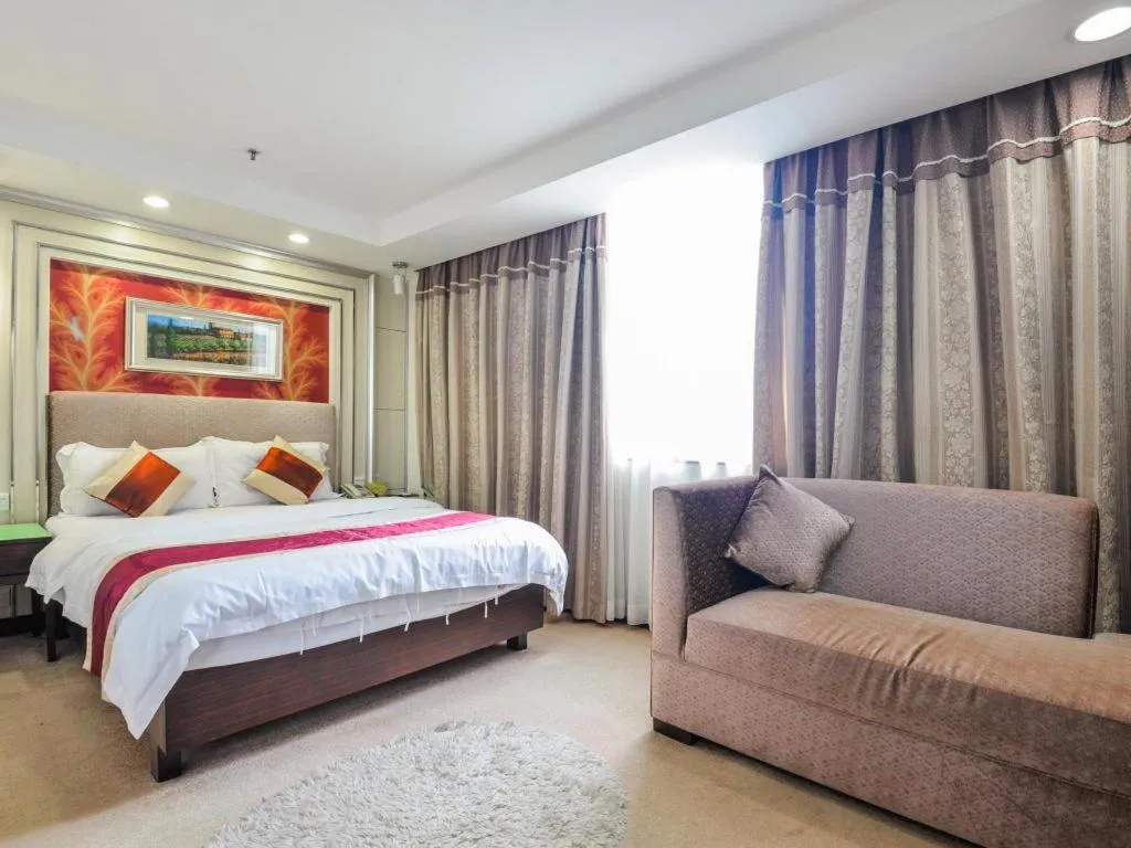 Bed in New World Hotel