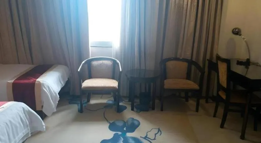 Bed in New World Hotel