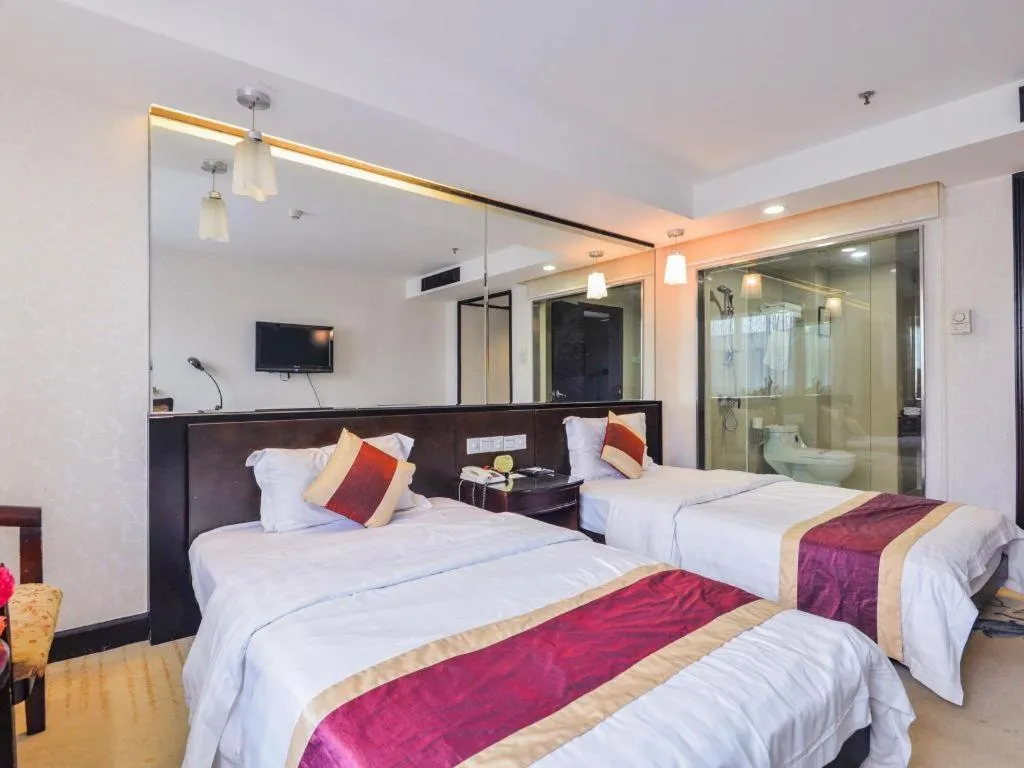 Bed in New World Hotel