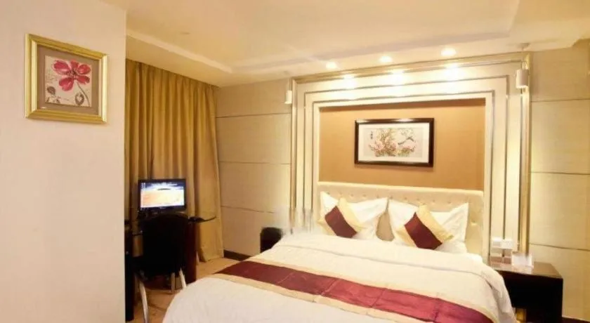 Bed in New World Hotel
