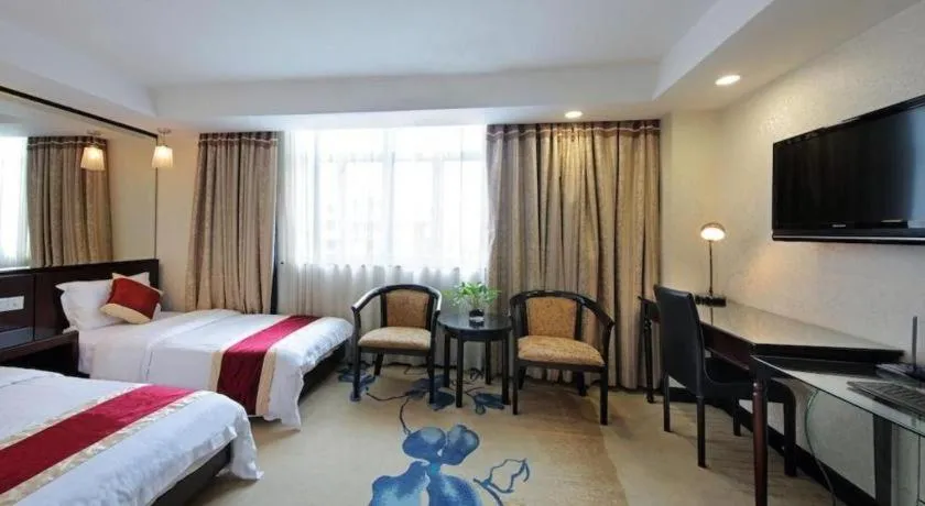 Bed in New World Hotel