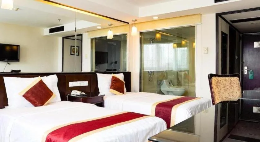 Bed in New World Hotel