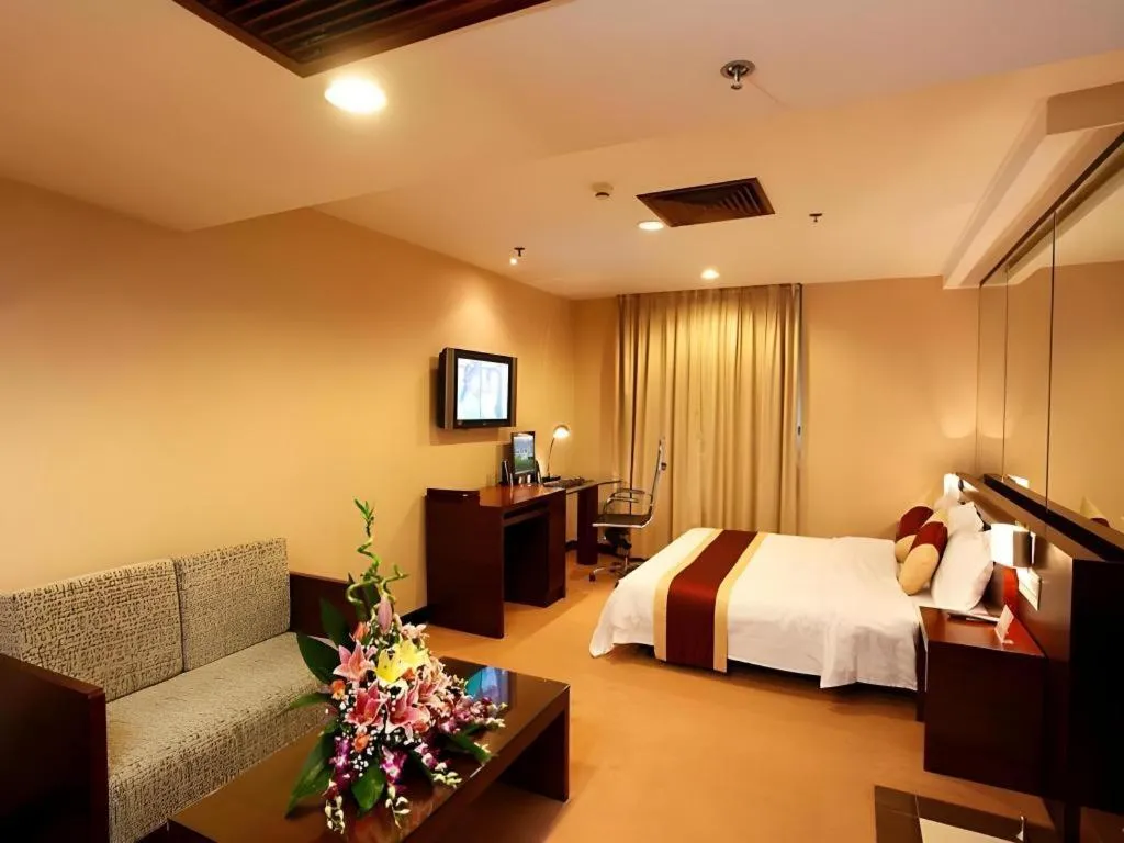 Bed in New World Hotel