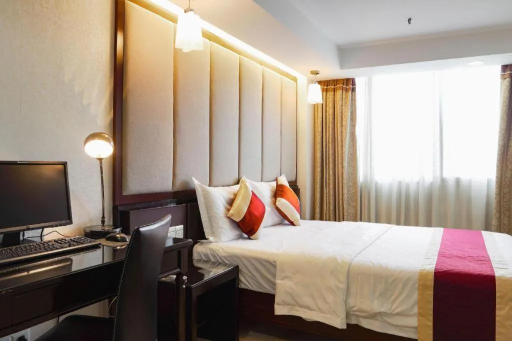 Bed in New World Hotel