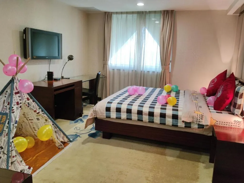 Bed in New World Hotel