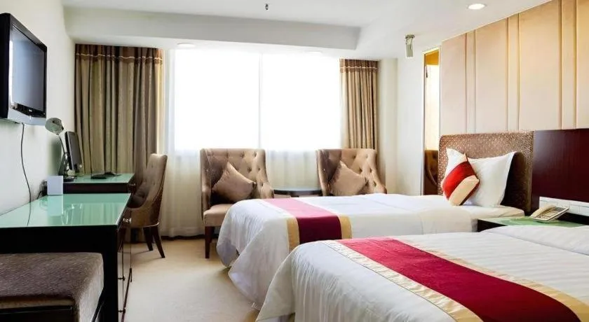 Bed in New World Hotel