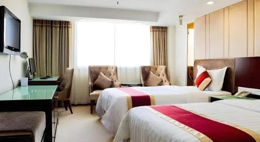 Bed in New World Hotel Bed in New World Hotel