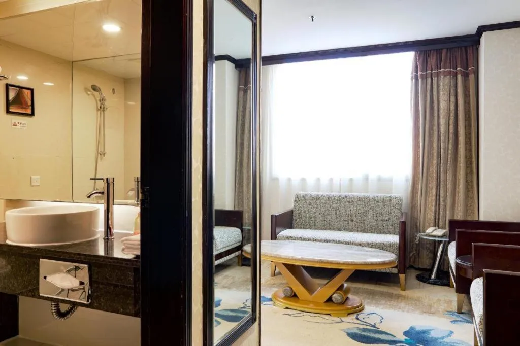 Bed in New World Hotel