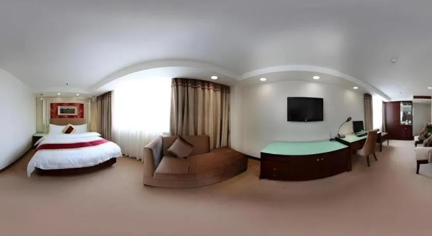 Bed in New World Hotel