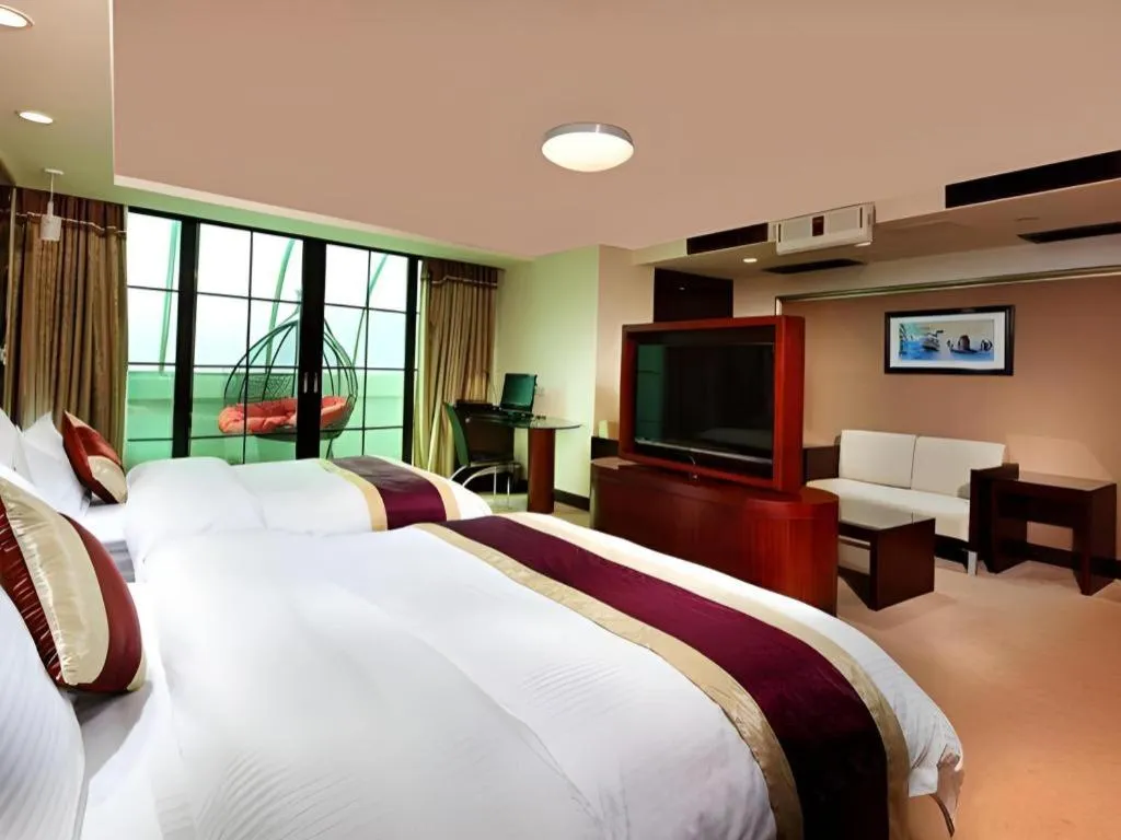 Bed in New World Hotel