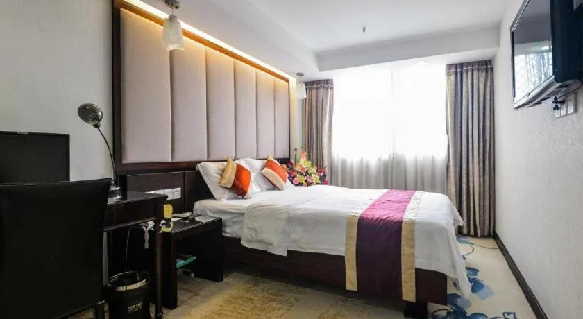 Bed in New World Hotel