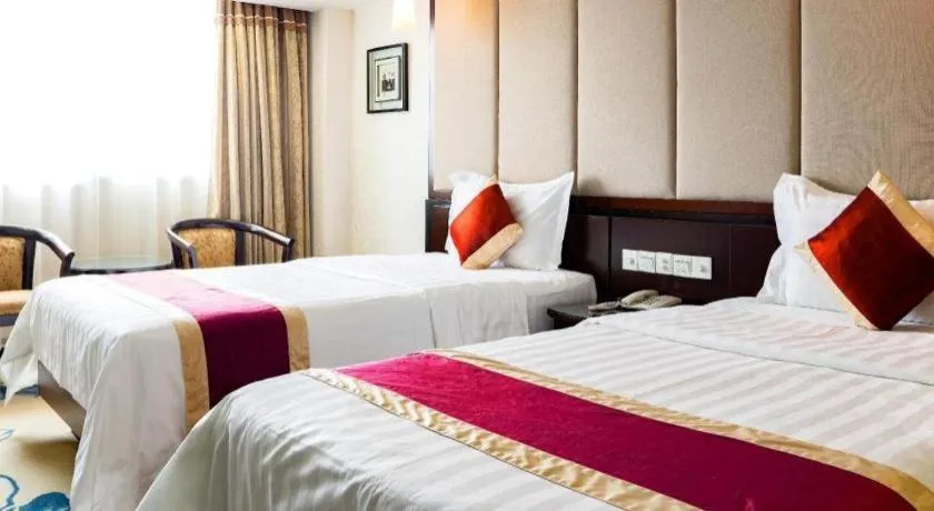 Bed in New World Hotel